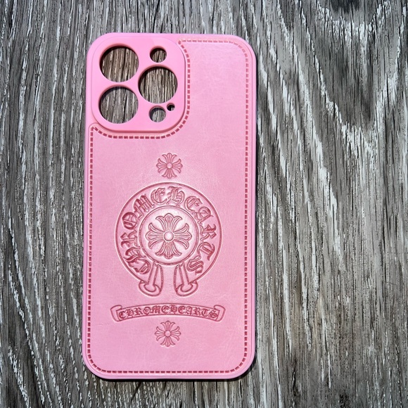 PINK CHROME HEARTS IPHONE CASE.